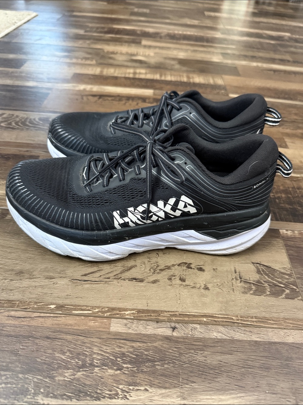 Hoka Men’s Black and White Athletic Running Shoes